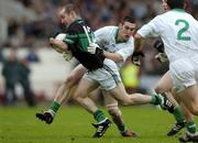23 October 2005; Sean O'Brien, Nemo Rangers, in action against Noel O'Leary and Colm O'Leary (2), Muskerry. Cork Senior Football Championship Final, Nemo Rangers v Muskerry. Pairc Ui Chaoimh, Cork. Picture credit: Brendan Moran / SPORTSFILE