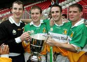 23 October 2005; Carrickmore's winning brothers, left to right, Ciaran Donnelly, Ciaran Mc Aleer, Mark Donnelly, Conor Mc Aleer, hold the cup after victory over Omagh. Tyrone Senior Football Championship Final, Omagh v Carrickmore. Omagh, Co. Tyrone. Picture credit: Oliver McVeigh / SPORTSFILE