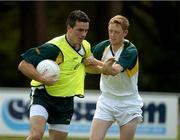 24 October 2005; Padraic Joyce is taclked by Colm Cooper during the Ireland team training in advance of the 2nd Fosters International Rules game between Australia and Ireland, Sorrento Oval, Sorrento, Mornington Peninsula, Melbourne, Australia. Picture credit; Ray McManus / SPORTSFILE