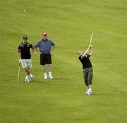 25 October 2005; Colm Cooper, Padraic Joyce and Larry Tompkins during a round of golf at the Portsea Golf Club, Sorrento, Mornington Peninsula, Melbourne, Victoria, Australia. Picture credit; Ray McManus / SPORTSFILE