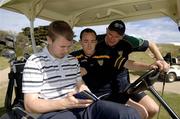 25 October 2005; Tomas O Se, Brian Dooher and Dr Con Murphy check the card during a round of golf at the Portsea Golf Club, Sorrento, Mornington Peninsula, Melbourne, Victoria, Australia. Picture credit; Ray McManus / SPORTSFILE