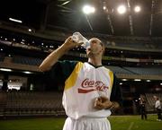 26 October 2005; Referee Michael Collins enjoys a drink after a light training session in advance of the 2nd Fosters International Rules game between Australia and Ireland, Telstra Dome, Melbourne, Australia. Picture credit; Ray McManus / SPORTSFILE