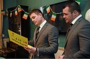 26 March 2014; Members of the victorious Ireland Six Nations squad Brian O'Driscoll and Cian Healy, right, reading congratulatory cards on a visit to Temple Street Children's University Hospital, Dublin. Picture credit: Ray McManus / SPORTSFILE