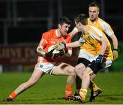 26 March 2014; Callum Comiskey, Armagh, in action against Conor O'Rawe and Mark McGarry, Antrim. Cadbury’s Ulster Under 21 Football Championship Quarter Final Replay, Antrim v Armagh, Páirc Esler, Newry, Co. Down. Picture credit: Oliver McVeigh / SPORTSFILE