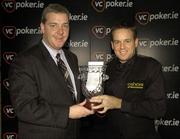 26 October 2005; Joe Swail is presented with the winners' cheque and trophy by Ian Marmion, left, Head of Victor Chandler Ireland, after defeating Ken Doherty 9 frames to 7. Swail also picked up a cheque for 500 euro for highest tournament break (142) which he recorded against Martin McCrudden in the quarter final. Swail becomes the first person to win the title since Ken Doherty in 1993. vcpoker.ie Irish Professional Snooker Championship Final, Ken Doherty.v.Joe Swail, Spawell, Tempelogue, Dublin. Picture credit: Brendan Moran / SPORTSFILE