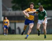 29 May 2016; Jamie Malone of Clare in action against Brian Fanning of Limerick during the Munster GAA Football Senior Championship quarter-final between Limerick and Clare at Gaelic Grounds in Limerick. Photo by Sam Barnes/Sportsfile