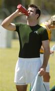 18 October 2005; Bryan Cullen, Dublin, takes a drink after a training session, at the Mandurah Football and Sports Club, in advance of the Fosters International Rules game between Australia and Ireland. Mandurah Football and Sports Club, Rushton Park, Mandurah, Perth, Western Australia. Picture credit; Ray McManus / SPORTSFILE