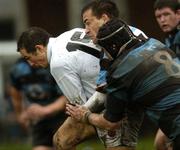 29 October 2005; Simon Mitchell, Dublin University, is tackled by Brian Tuohy and Eddie Halvey, (8), Shannon. AIB All Ireland League 2005-2006, Division 1, Dublin University v Shannon, College Park, Trinity College, Dublin. Picture credit: Damien Eagers / SPORTSFILE