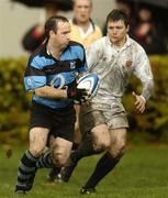 29 October 2005; Frankie McNamara, Shannon, is tackled by Matt D'arcy, Dublin University. AIB All Ireland League 2005-2006, Division 1, Dublin University v Shannon, College Park, Trinity College, Dublin. Picture credit: Damien Eagers / SPORTSFILE
