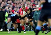 29 October 2005; Shaun Payne, Munster, is tackled by Laurent Marticorena and Freddie Tuilagi, Castres Olympique. Heineken Cup 2005-2006, Pool 1, Munster v Castres Olympique, Thomond Park, Limerick. Picture credit; Kieran Clancy / SPORTSFILE