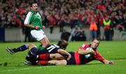 29 October 2005; Trevor Halstead, Munster, touches down to score a try despite the tackle by Phil Christopher, Castres Olympique. Heineken Cup 2005-2006, Pool 1, Munster v Castres Olympique, Thomond Park, Limerick. Picture credit; Kieran Clancy / SPORTSFILE