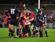 29 October 2005; Trevor Halstead, Munster, is congratulated by Shaun Payne, left, and John Kelly, right, after scoring a try against Castres Olympique. Heineken Cup 2005-2006, Pool 1, Munster v Castres Olympique, Thomond Park, Limerick. Picture credit; Kieran Clancy / SPORTSFILE