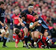 29 October 2005; Denis Leamy, Munster, is tackled by Mathieu Barrau, Castres Olympique. Heineken Cup 2005-2006, Pool 1, Munster v Castres Olympique, Thomond Park, Limerick. Picture credit; Kieran Clancy / SPORTSFILE