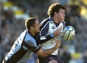 30 October 2005; Shane Horgan, Leinster, is tackled by Andrew Henderson, Glasgow Warriors. Heineken Cup 2005-2006, Pool 5, Glasgow Warriors v Leinster, Hughenden, Glasgow, Scotland. Picture credit: Brian Lawless / SPORTSFILE