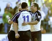 30 October 2005; Leinster's Gordon D'Arcy (hidden) is congratulated by team-mates Felipe Contepomi, right, and Rob Kearney after scoring a try. Heineken Cup 2005-2006, Pool 5, Glasgow Warriors v Leinster, Hughenden, Glasgow, Scotland. Picture credit: Brian Lawless / SPORTSFILE