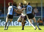 30 October 2005; Ben Gissing, Leinster, is tackled by Colin Gregor, left, and Andrew Henderson, Glasgow Warriors. Heineken Cup 2005-2006, Pool 5, Glasgow Warriors v Leinster, Hughenden, Glasgow, Scotland. Picture credit: Brian Lawless / SPORTSFILE