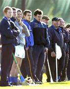 30 October 2005; New Tipperary manager Michael Babs Keating, 7th from left, and selectors Tom Barry, 6th from left, and John Leahy, look on from the sideline. Hurling Challenge match, Dublin v Tipperary, O'Toole's GAA Club, Ayrfield Park, Coolock, Dublin. Picture credit: Brendan Moran/ SPORTSFILE