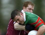 30 October 2005; James Egan, Loughmore-Castleiney, in action against Alan John Lonergan, Ardfinnan. Tipperary County Senior Football Championship Final, Ardfinnan v Loughmore-Castleiney, Leahy Park, Cashel, Co. Tipperary. Picture credit: Matt Browne / SPORTSFILE