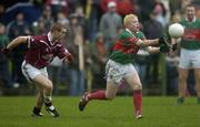 30 October 2005; Derek Bourke, Loughmore-Castleiney, in action against Peter Hally, Ardfinnan. Tipperary County Senior Football Championship Final, Ardfinnan v Loughmore-Castleiney, Leahy Park, Cashel, Co. Tipperary. Picture credit: Matt Browne / SPORTSFILE