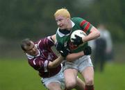 30 October 2005; Derek Bourke, Loughmore-Castleiney, in action against Cathal Hennessy, Ardfinnan. Tipperary County Senior Football Championship Final, Ardfinnan v Loughmore-Castleiney, Leahy Park, Cashel, Co. Tipperary. Picture credit: Matt Browne / SPORTSFILE
