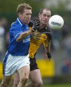 30 October 2005; Conor McCarthy, Munster, in action against Kevin McCloy, Ulster. M Donnelly Interprovincial Football Championship Semi-Final, Ulster v Munster, St. Oliver Plunkett Park, Crossmaglen, Co. Armagh. Picture credit: Damien Eagers / SPORTSFILE