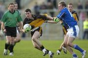 30 October 2005; Andy Mallon, Ulster, in action against James Masters, Munster. M Donnelly Interprovincial Football Championship Semi-Final, Ulster v Munster, St. Oliver Plunkett Park, Crossmaglen, Co. Armagh. Picture credit: Damien Eagers / SPORTSFILE