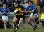 30 October 2005; Paddy Bradley, Ulster, in action against Michael McCarthy, Munster. M Donnelly Interprovincial Football Championship Semi-Final, Ulster v Munster, St. Oliver Plunkett Park, Crossmaglen, Co. Armagh. Picture credit: Damien Eagers / SPORTSFILE