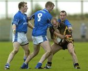 30 October 2005; Dick Clerkin, Ulster, in action against Munster players from left Paddy Kelly, Nicholas Murphy and Kieran O'Connor. M Donnelly Interprovincial Football Championship Semi-Final, Ulster v Munster, St. Oliver Plunkett Park, Crossmaglen, Co. Armagh. Picture credit: Damien Eagers / SPORTSFILE