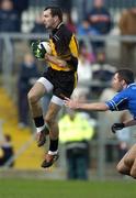 30 October 2005; Steven McDonnell, Ulster, in action against Michael McCarthy, Munster. M Donnelly Interprovincial Football Championship Semi-Final, Ulster v Munster, St. Oliver Plunkett Park, Crossmaglen, Co. Armagh. Picture credit: Damien Eagers / SPORTSFILE