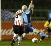 31 October 2005; Derry City's Stephen O'Flynn beats Conor Kenna, UCD, to score his sides first goal. eircom League, Premier Division, UCD v Derry City, Belfield Park, UCD, Dublin. Picture credit: David Maher / SPORTSFILE