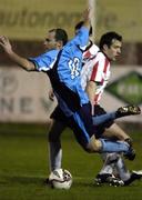 31 October 2005; Damien Dupuy, UCD, in action against Ciaran Martyn, Derry City. eircom League, Premier Division, UCD v Derry City, Belfield Park, UCD, Dublin. Picture credit: David Maher / SPORTSFILE