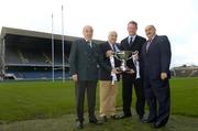 3 November 2005; At the draw for the new AIB Cup, from left to right, are Andy Crawford, President of the IRFU, Bobby Kahn, Manager, Cork Constitution, Mick Galwey, Shannon Coach, and Jim Kelly, Sponsorship manager, AIB. It was also announced that Mick Galwey, former Irish Rugby International and current Shannon coach, is to take up the position of manager of the AIB Club International team, which is an Irish team consisting wholly of club players. Lansdowne Road, Dublin. Picture credit: Brian Lawless / SPORTSFILE