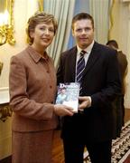 3 November 2005; Former Dublin Footballer Dessie Farrell presents his book 'Tangled Up in Blue' to President of Ireland, Mary McAleese. Aras an Uachtarain, Phoenix Park, Dublin. Picture credit: Damien Eagers / SPORTSFILE