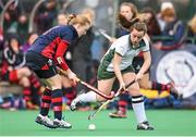 28 March 2014; Gemma Rhatigan, Salerno, in action against Tara Mcllwaine, Lurgan College.  Electric Ireland Kate Russell All-Ireland School Girls Hockey Final Tournament, Salerno, Co. Galway v Lurgan College, Co. Armagh. St Andrews College, Booterstown, Co Dublin. Picture credit: Matt Browne / SPORTSFILE