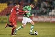 28 March 2014; Ronan Finn, Shamrock Rovers, in action against Seamus Conneely, Sligo Rovers. Airtricity League Premier Division, Shamrock Rovers v Sligo Rovers, Tallaght Stadium, Tallaght, Co. Dublin. Picture credit: David Maher / SPORTSFILE