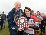 29 March 2014; Mullingar captain Niamh Kennedy is presented with the Paul Flood Plate by Leinster Branch President Paul Derring after the game. The Paul Flood Plate Final, Mullingar v Wexford Wanderers, NUIM Barhnall RFC, Leixlip, Co. Kildare. Picture credit: Barry Cregg / SPORTSFILE