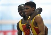 29 March 2014; Joseph Ojewumi, Tallaght A.C., is congratulated by team-mate Clincy Mutanga, left, after winning the U18 Boy's 4x200m Final at the Woodie’s DIY Juvenile Indoor Track and Field Championships. Athlone Institute of Technology International Arena, Athlone, Co. Westmeath. Picture credit: Pat Murphy / SPORTSFILE