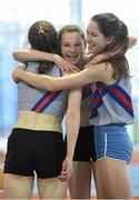 29 March 2014; Sarah Torrens, Dundrum South Dublin A.C., celebrates with team-mates Katie Magee, centre, and Niamh Gowing, right, after winning the U16 Girl's 4x200m Final at the Woodie’s DIY Juvenile Indoor Track and Field Championships. Athlone Institute of Technology International Arena, Athlone, Co. Westmeath. Picture credit: Pat Murphy / SPORTSFILE