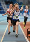 29 March 2014; Ella Healy, Ratoath A.C., crosses the finish line to win the U12 Girl's 4x100m Final at the Woodie’s DIY Juvenile Indoor Track and Field Championships. Athlone Institute of Technology International Arena, Athlone, Co. Westmeath. Picture credit: Pat Murphy / SPORTSFILE