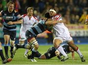 29 March 2014; John Afoa, Ulster, is tackled by  Ellis Jenkins, Cardiff Blues. Celtic League 2013/14, Round 18, Cardiff Blues v Ulster, Cardiff Arms Park, Cardiff, Wales. Picture credit: Steve Pope / SPORTSFILE
