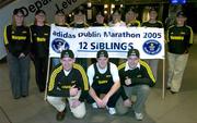 30 October 2005; Impossible is nothing for the Irwin family from Donegal as they attempt to break the &quot;Most Siblings to Complete the same Marathon&quot; record at the 2005 Dublin City Marathon. Pictured back from left, Margaret, Maria, Rosemary, Cecilia, Geraldine, Josephine, Katrina, Patricia and Veronica. Front, from left, Frank, Barry and Martin. Picture credit; Brendan Moran / SPORTSFILE