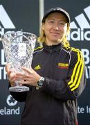 31 October 2005; Zinaida Semenova of Russia with her trophy after winning the Women's race at the 2005 adidas Dublin City Marathon. Picture credit: Brendan Moran / SPORTSFILE