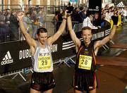 31 October 2005; Pauric McKinney, right, and Gary Crossan after they finished 2nd and 1st Irish men home respectively, which also doubled as the National Marathon Championship, during the 2005 adidas Dublin City Marathon. Picture credit: Pat Murphy / SPORTSFILE