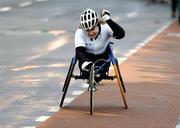 31 October 2005; Patrice Dockery celebrates after winning the Women's wheelchair section during the 2005 adidas Dublin City Marathon. Picture credit: Brendan Moran / SPORTSFILE