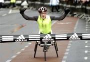 31 October 2005; John Glynn celebrates as he comes home to win the Men's Wheelchair section during the 2005 adidas Dublin City Marathon. Picture credit: Brendan Moran / SPORTSFILE