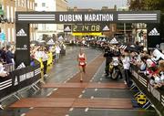 31 October 2005; Neo Molema of South Africa crosses the line on finishing 2nd during the 2005 adidas Dublin City Marathon. Picture credit: Pat Murphy / SPORTSFILE