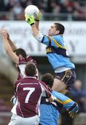6 November 2005; Barry Dooney, Salthill-Knocknacarra, catches a high ball against Crossmolina's Michael Moyles. Connacht Club Senior Football Championship Semi-Final, Salthill-Knocknacarra v Crossmolina, Pearse Stadium, Galway. Picture credit: Damien Eagers / SPORTSFILE
