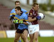 6 November 2005; Gabriel Walsh, Crossmolina, in action against Barry Dooney, Salthill-Knocknacarra. Connacht Club Senior Football Championship, Semi-Final, Salthill-Knocknacarra v Crossmolina, Pearse Stadium, Galway. Picture credit: Damien Eagers / SPORTSFILE