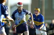 30 October 2005; Keith Wilson, Dublin, in action against Donal Shelley, Tipperary. Hurling Challenge match, Dublin v Tipperary, O'Toole's GAA Club, Ayrfield Park, Coolock, Dublin. Picture credit: Brendan Moran/ SPORTSFILE