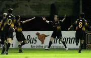 7 November 2005; Joe Gamble, second from right, Cork City, celebrates after scoring his sides second goal with team-mates, left to right, George O'Callaghan, Billy Woods and Neal Fenn. eircom League, Premier Division, Shamrock Rovers v Cork City, Dalymount Park, Dublin. Picture credit: David Maher / SPORTSFILE